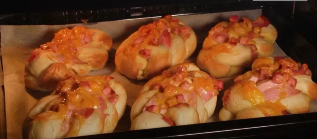 Obrázek receptu na zapečené houstičky se sýrem a slaninou