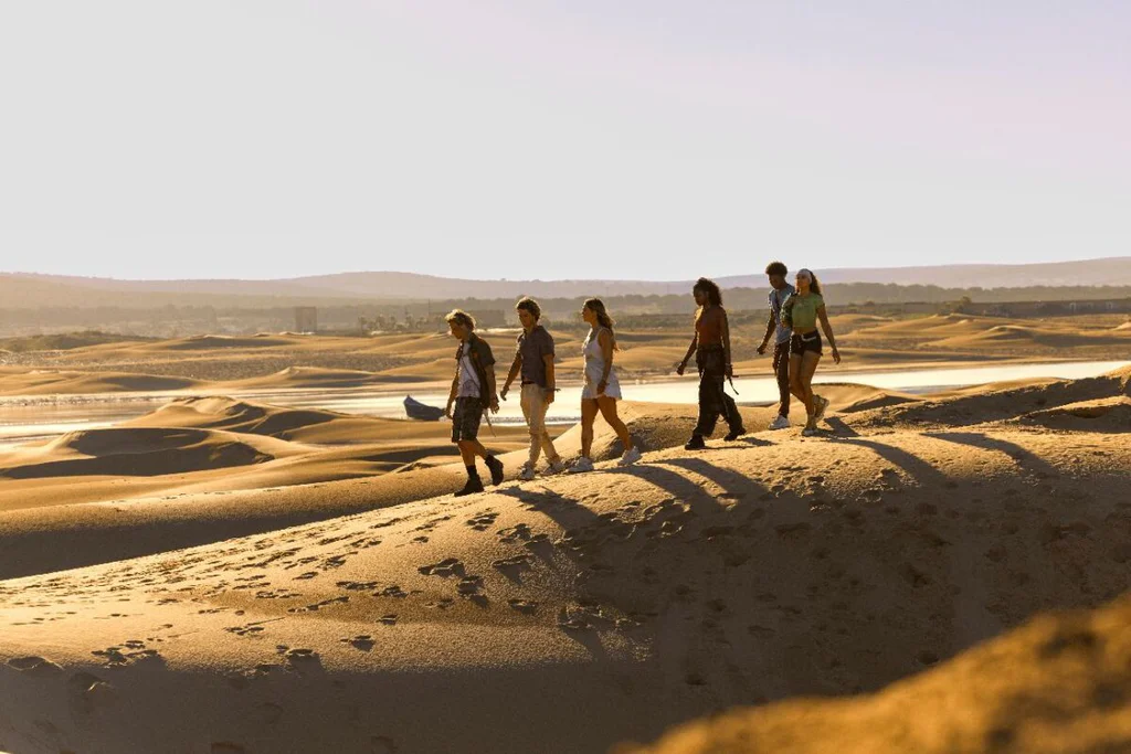 Outer Banks. (L to R) Rudy Pankow as JJ, Chase Stokes as John B, Madelyn Cline as Sarah Cameron, Carlacia Grant as Cleo, Jonathan Daviss as Pope, Madison Bailey as Kiara