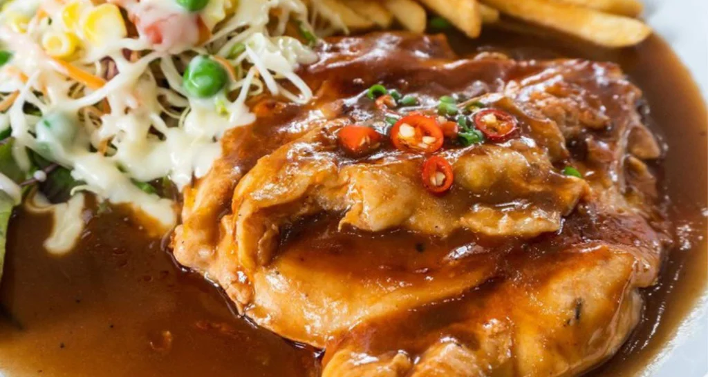 Obrázek receptu na přírodní kuřecí řízky s pikantním nádechem.