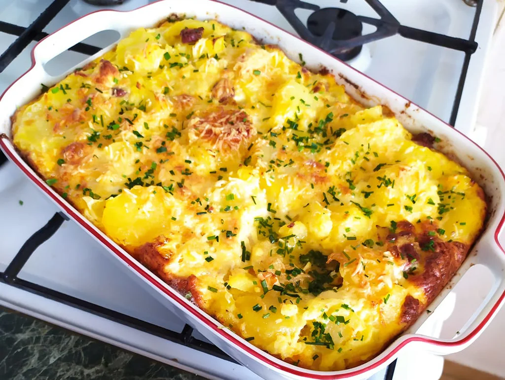 Obrázek receptu na Skromné brambory ve slavnostním saku: Prezidentské brambory s Hermelínem