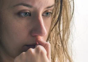 Detail tváře smutné ženy