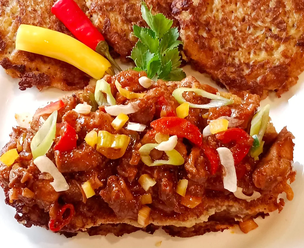 Obrázek k receptu na chleba v bramborákovém těstíčku s pikantní kuřecí směsí