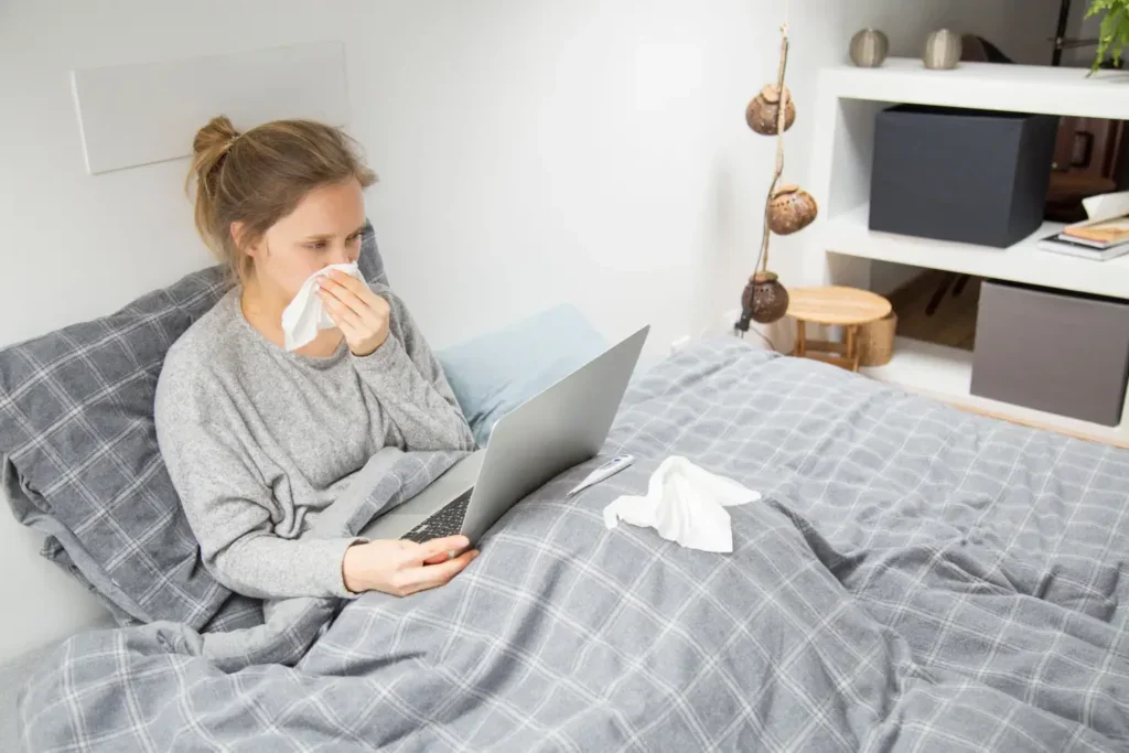 nemocná žena v posteli