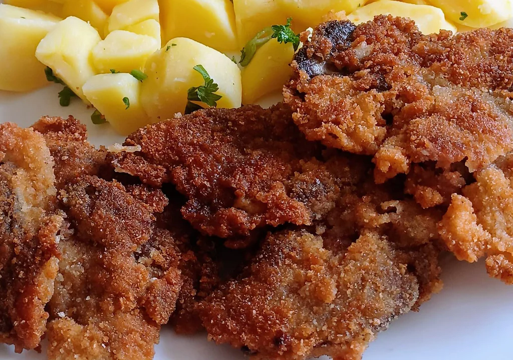 Obalovaná jatýrka v Americe a smažená dozlatova.