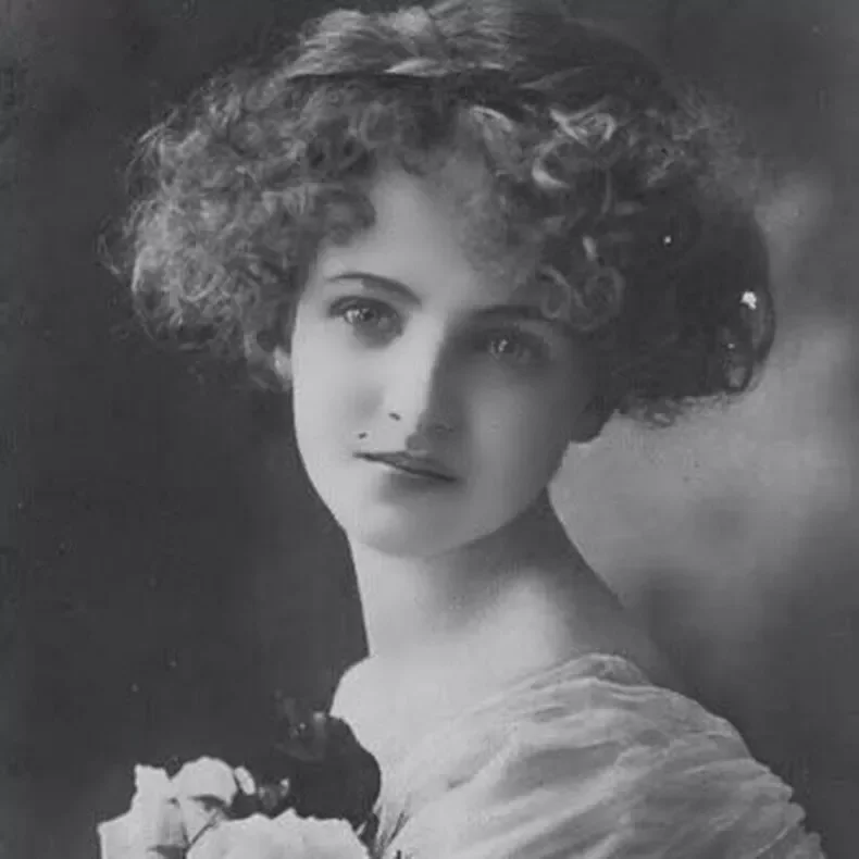 63fd8b5510675-Black-and-white-photograph-of-a-woman-with-flowers.jpg.webp